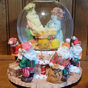 Mr. and Mrs. Clause Baking with Elves Christmas Snow Globe